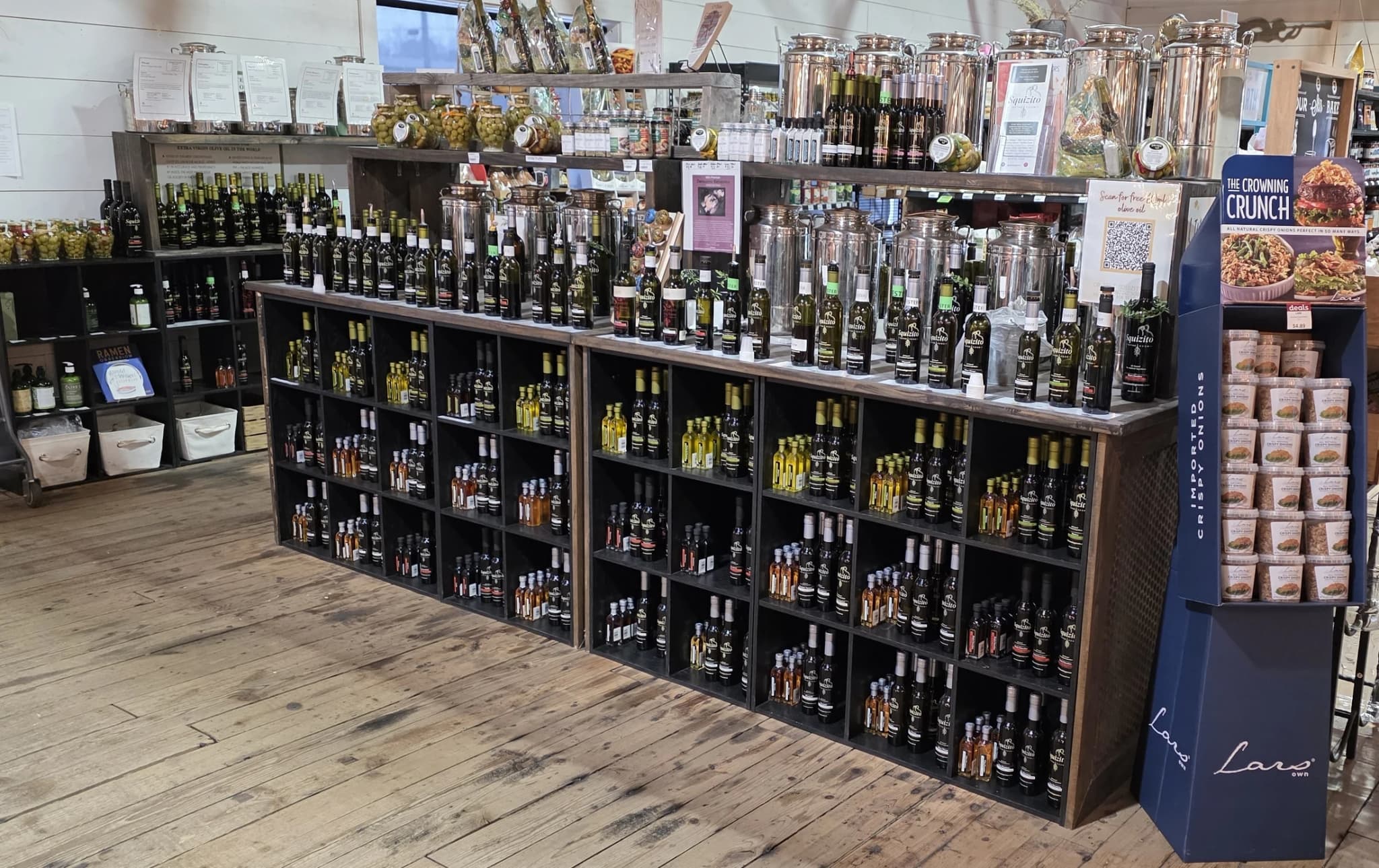 The Squizito tasting display, lined with extra virgin olive oils and balsamic vinegars
