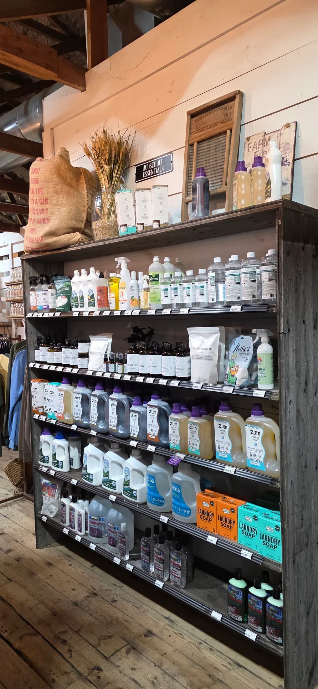 Shelves of natural laundry soaps and household essentials